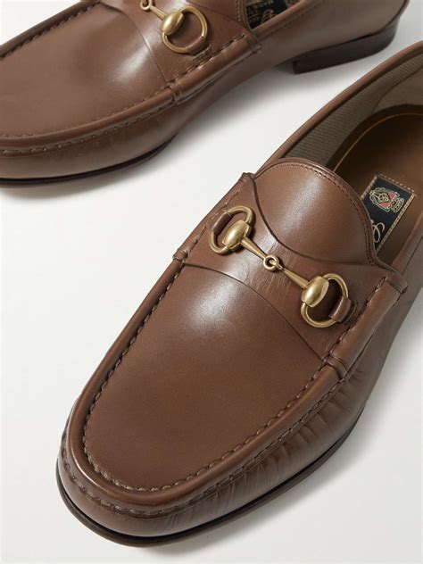 will gucci loafers stretch|donning Gucci loafers.